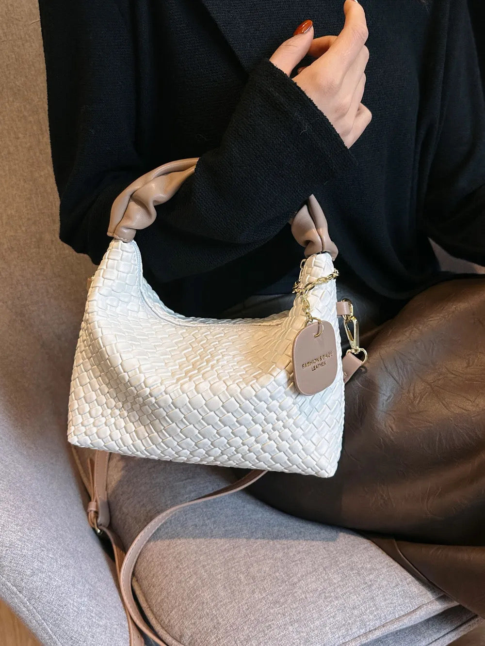 Woven crossbody leather handbag