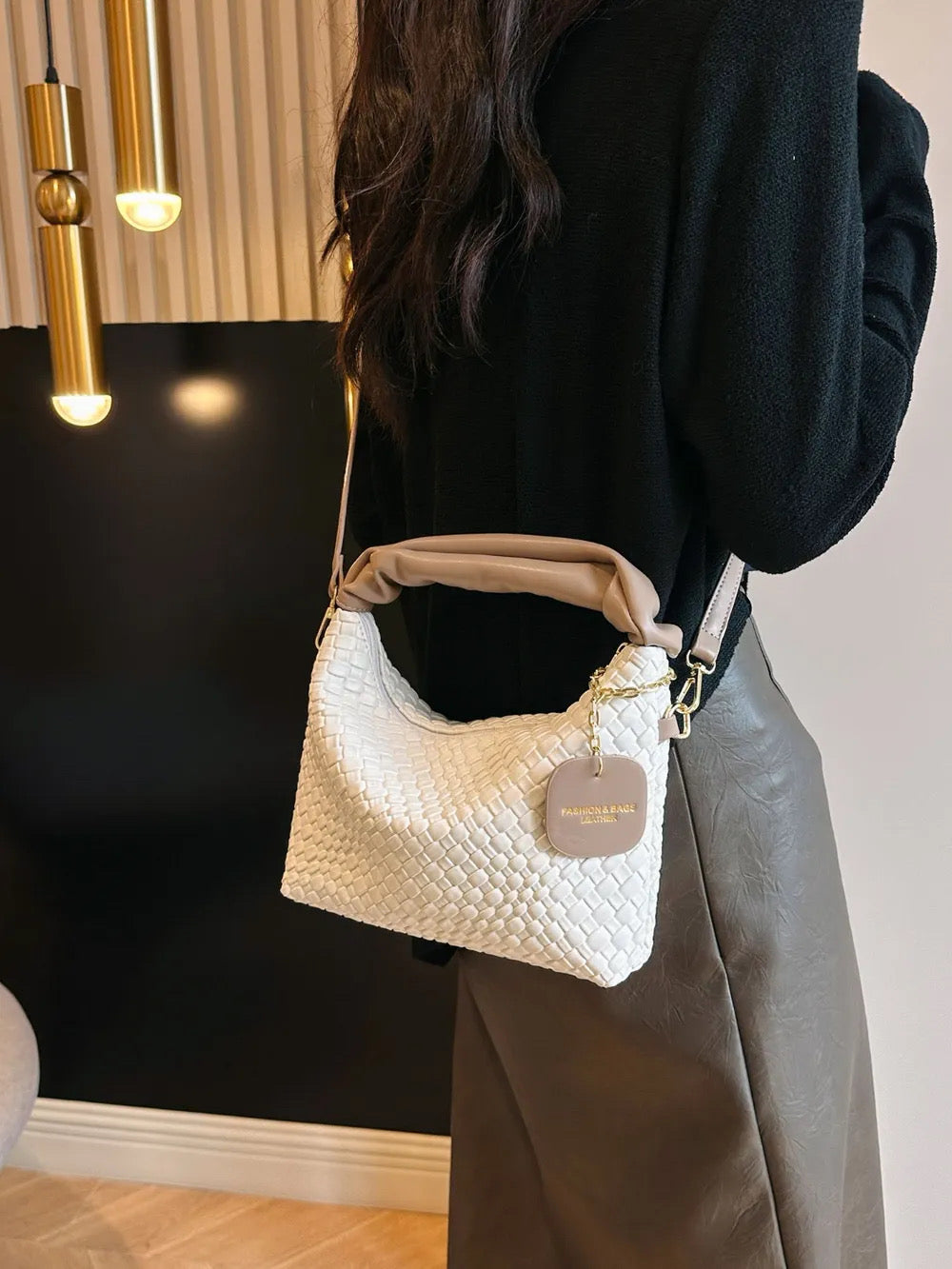 Woven crossbody leather handbag