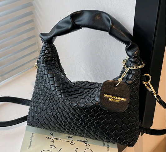 Woven crossbody leather handbag
