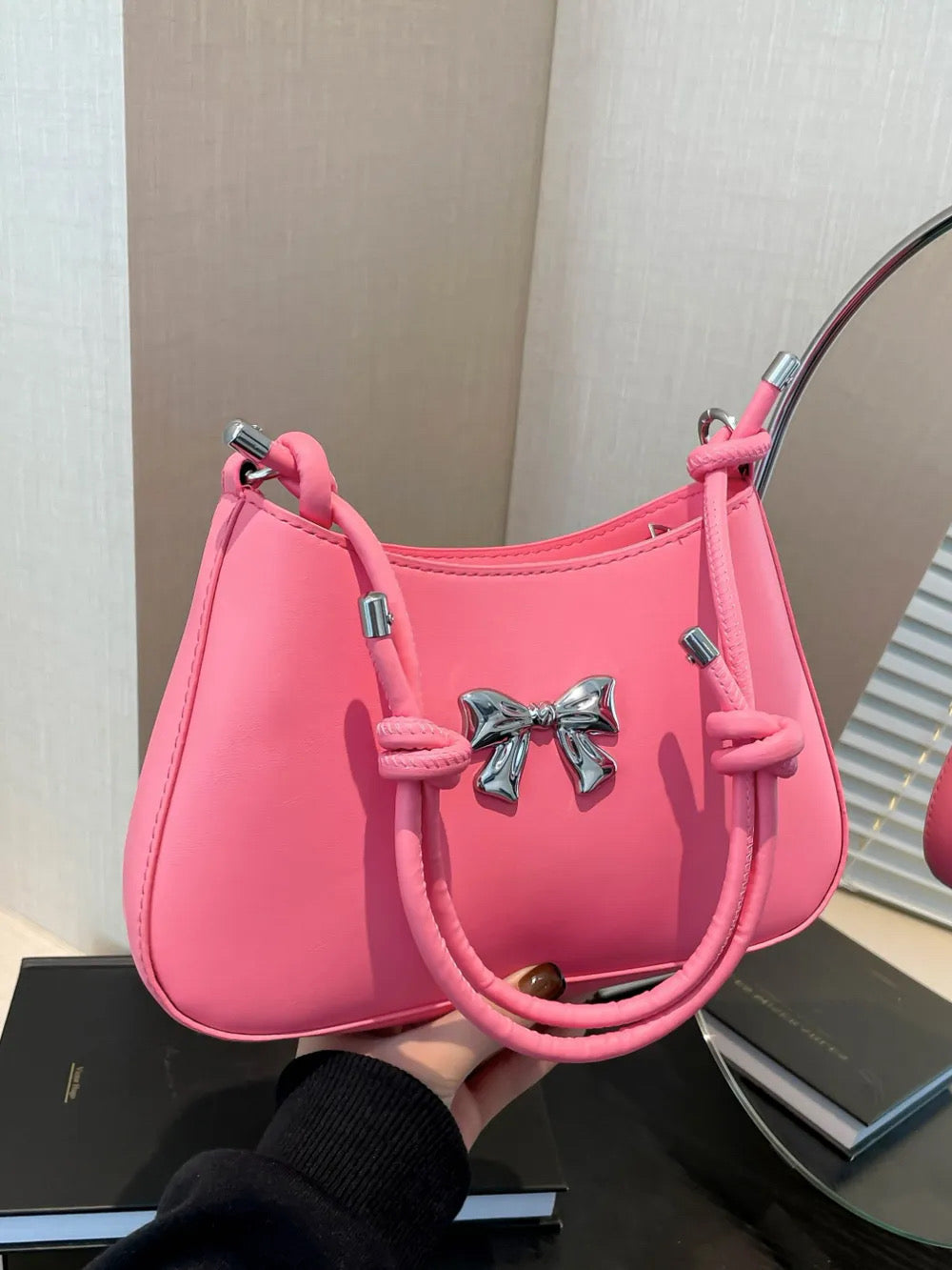 Bow knotted strap bag