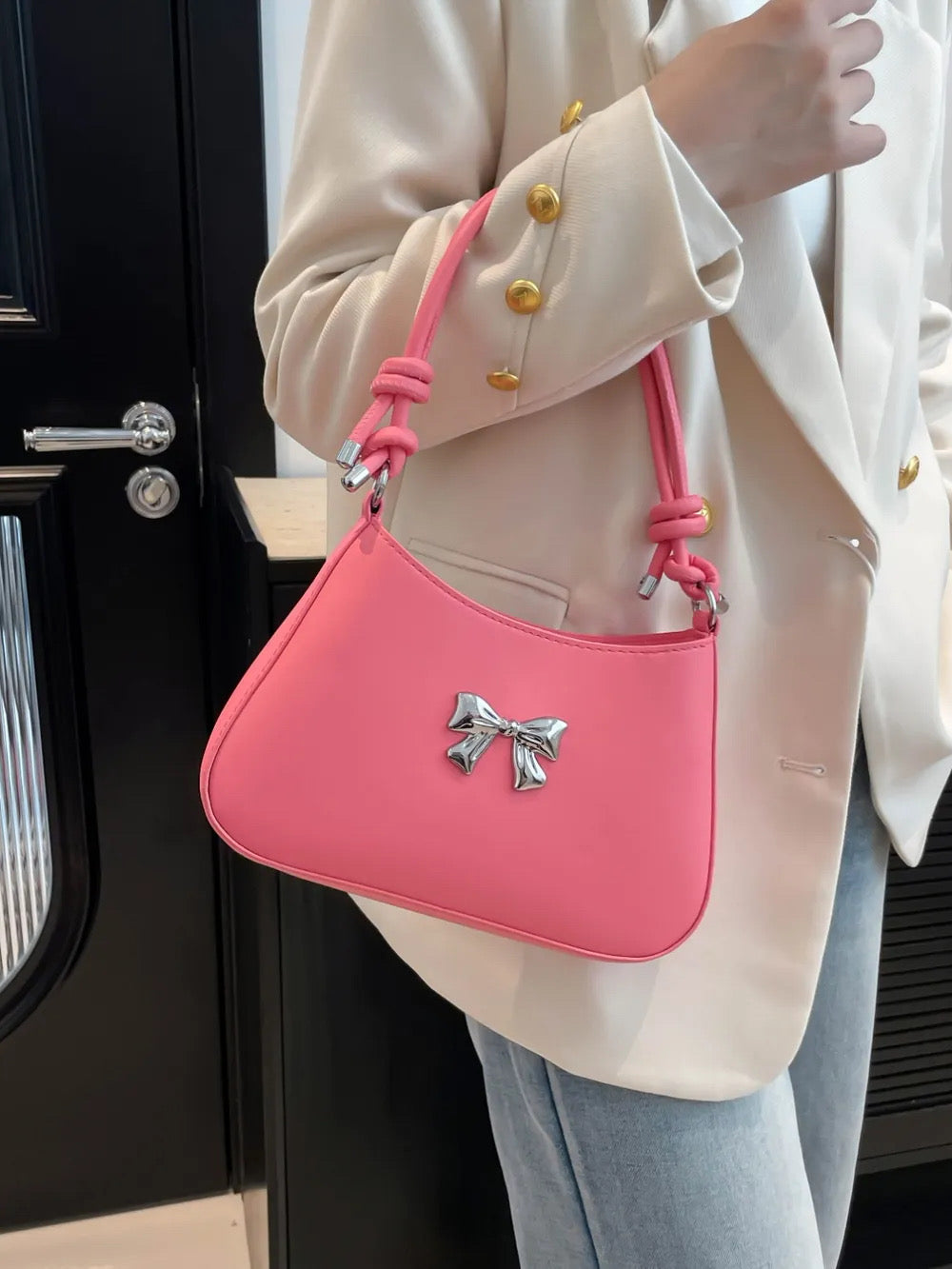 Bow knotted strap bag
