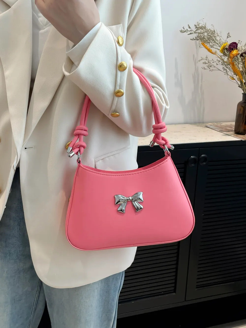 Bow knotted strap bag