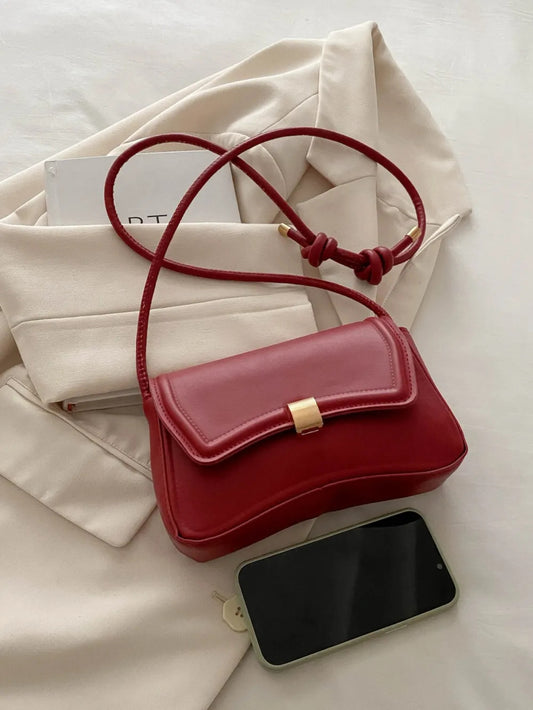 Bella Knotted strap leather handbag